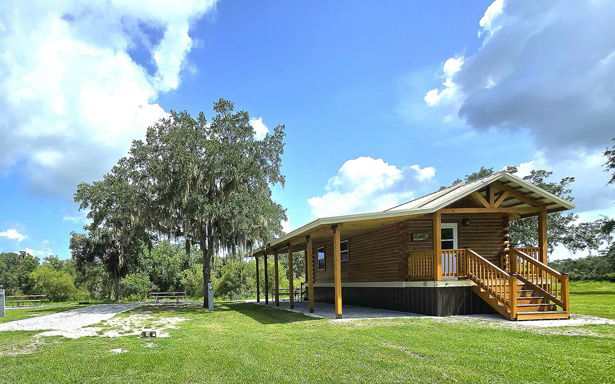 Cabin and nearby campsites at Peace River Campground in Arcadia